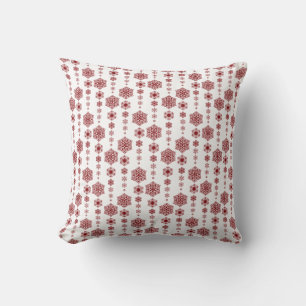 Coussin des flocons rouges