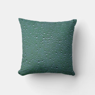 Coussin Des gouttelettes d'eau sur un Arrière - plan vert