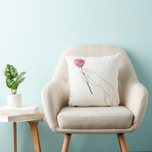 Coussin Dessin au trait Main tenant une rose rose