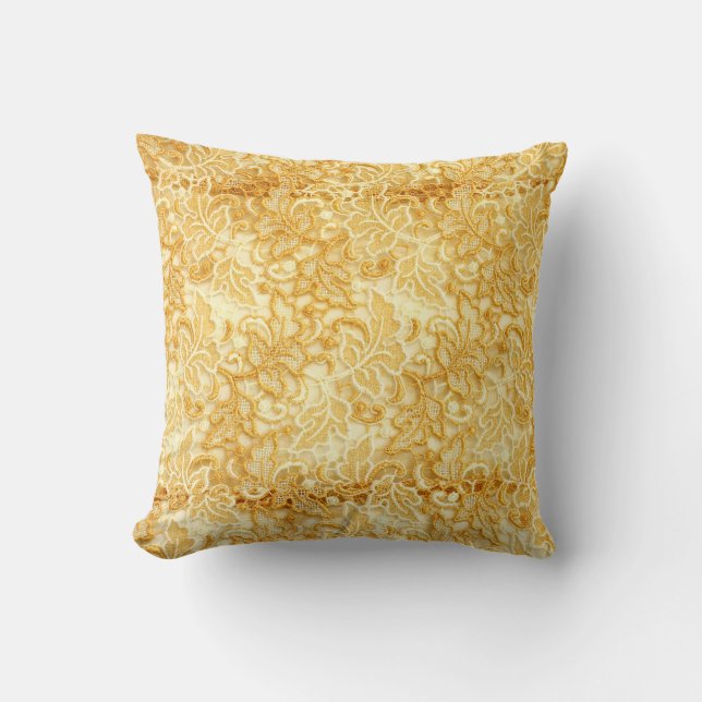 Coussin Détail en dentelle d'or, tissu. (Recto)
