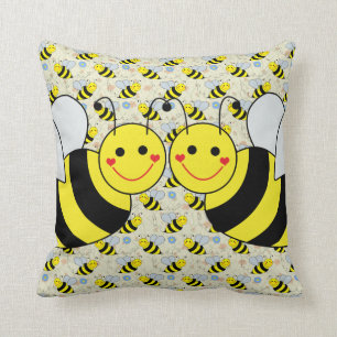 Coussin Deux mignons gaffent des abeilles