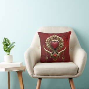 Coussin Élégance en lustre rouge avec un coeur orné.
