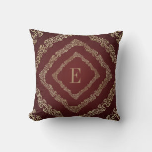 Coussin Élégante lettre E monogramme en Bourgogne et or