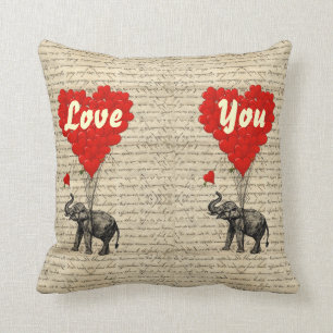 Coussin Éléphant et ballons en forme de coeur