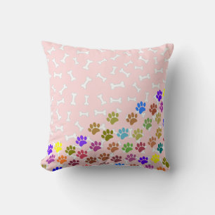 Coussin Empreintes de pattes de chiot colorées et os rose 