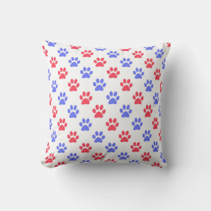 Coussin Empreintes de pattes en bleu et rouge