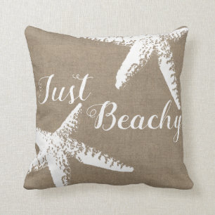 Coussin Étoiles de mer et toile de jute blanches côtièr