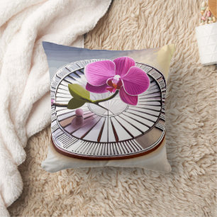 Coussin Exquise orchidée rose repose sur une plaque d'arge