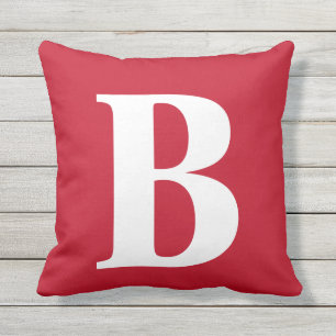 Coussin extérieur monogramme rouge gras