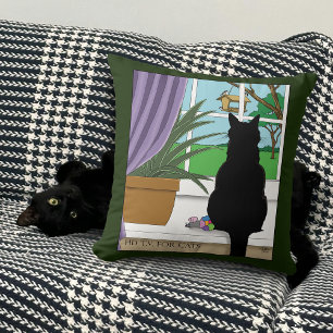 Coussin Fenêtre Chat noir regardant dehors