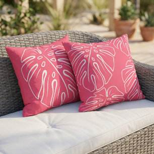 Coussin Feuille tropicale blanche sur fond rose framboise