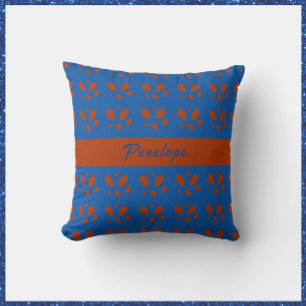 Coussin Feuilles botaniques de jolie rouille sur le bleu r