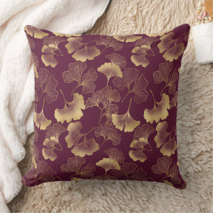 Coussin Feuilles de Ginkgo dorées luxueuses sur un bordeau