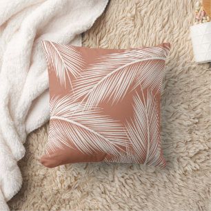 Coussin Feuilles de palmier blanc sur arrière - plan coule