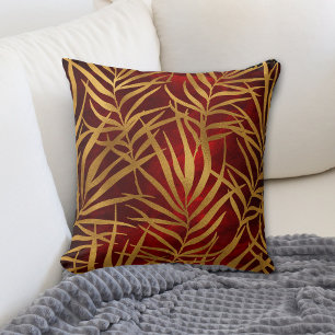 Coussin Feuilles Gold Tropical sur le rouge Bourgogne