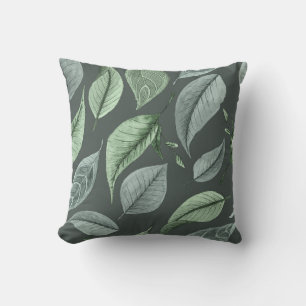 Coussin Feuilles tombant dans les tons vert gris céladon