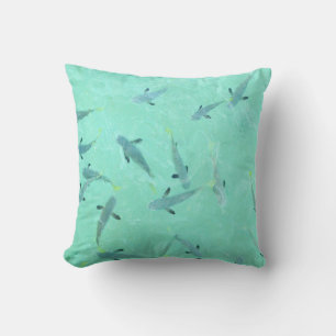 Coussin Fidji poissons nageant dans une eau bleu clair
