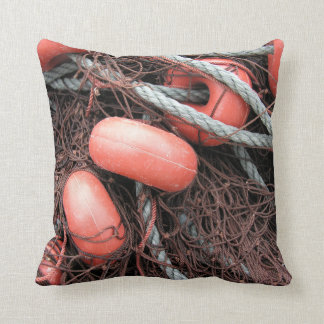 Coussin Filets de pêche, flotteurs et corde sur le port
