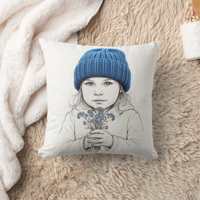 Coussin Fille avec un chapeau bleu tricoté (Couverture)