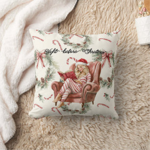 Coussin Fille dans un fauteuil chapeau de Père Noël canne