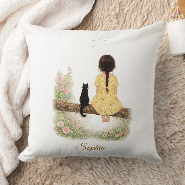 Coussin Fille et chat noir sur une branche (Couverture)