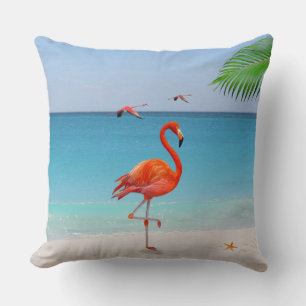 Coussin Flamant rose corail et feuille de palmier sur la p