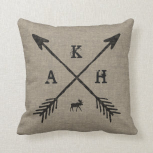 Coussin Flèches, lettres monographiques et décoratives d'o