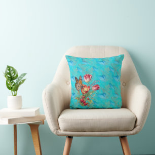 Coussin Fleurs aquarelles avec papillons visités.
