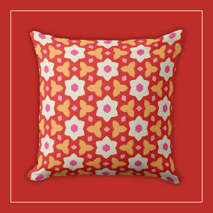 Coussin Fleurs blanches sur fond floral géométrique rouge