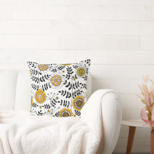 Coussin Fleurs de gribouillis et feuilles en jaune et noir