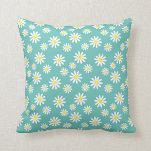 Coussin Fleurs de marguerite sur un fond bleu