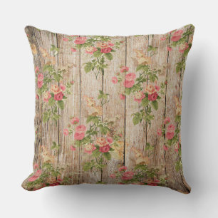 Coussin Fleurs délicates vintage rose et blanc sur bois