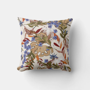 Coussin Fleurs pastel fleurissant lis de feuilles verts. R