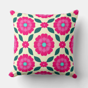 Coussin Fleurs roses avec centres bleus et feuilles vertes
