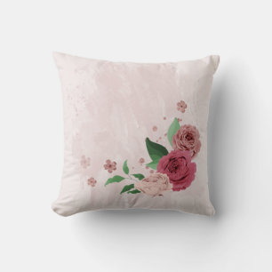 Coussin fleurs roses feuilles vertes