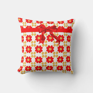 Coussin Fleurs rouges et ruban avec des points dorés sur f