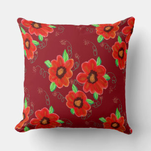 Coussin Fleurs rouges orange vif sur framboise foncée