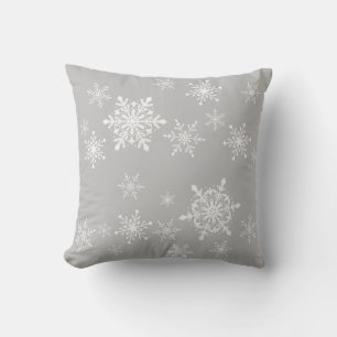 Coussin flocons de neige sur le gris
