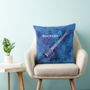 Coussin Flocs bleus de peinture d'ensemble de guitare