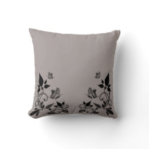 Coussin floral de papillon d'ébène