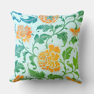 Coussin Flore orange et verdure sur bleu clair