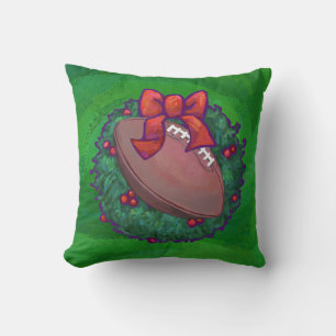 Coussin Football en couronne de Noël sur vert