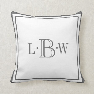 Coussin Frontière grise classique décorée d'un monogram
