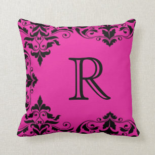 Coussin fuchsia et noir de damassé de monogramme