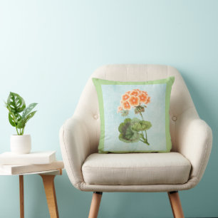 Coussin Géranium sur jean vieilli
