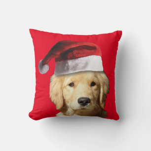 Coussin Golden Retriever portant un casquette du Père Noël