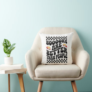 Coussin Graphisme damier rétro "Les livres sont meilleurs"