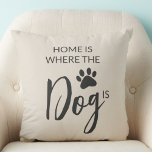 Coussin Home Is Where The Dog Is<br><div class="desc">This dog lover's throw pillow features a dog's paw print and reads,  "Home is where the dog is."</div>