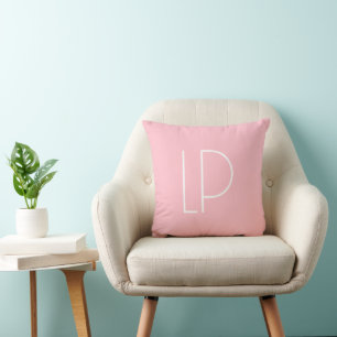 Coussin Initiale moderne minimaliste élégante sur fond ros