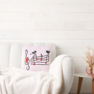 Coussin Inséparables de musique en rose